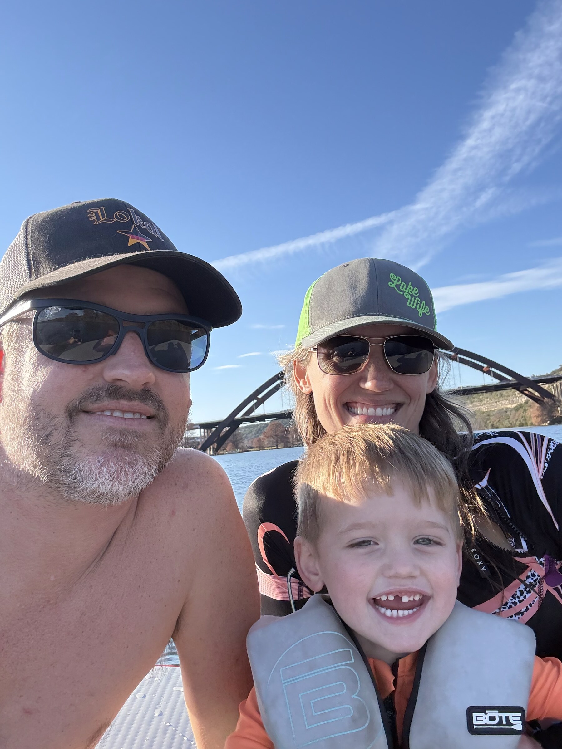 Family inside a hollow tree on a Wimberley, Texas trail