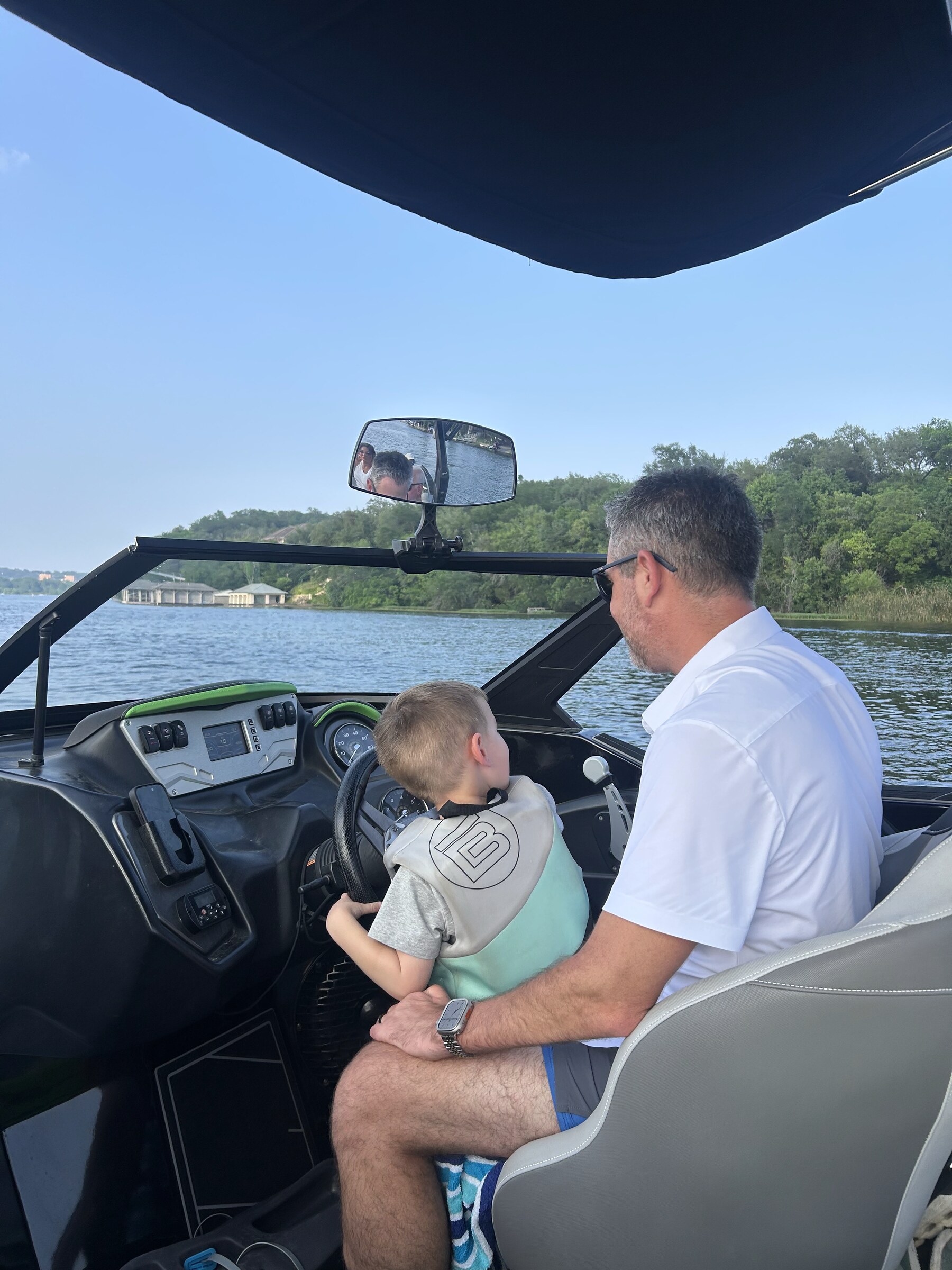 Family at a Catrina sculpture during Day of the Dead in San Antonio