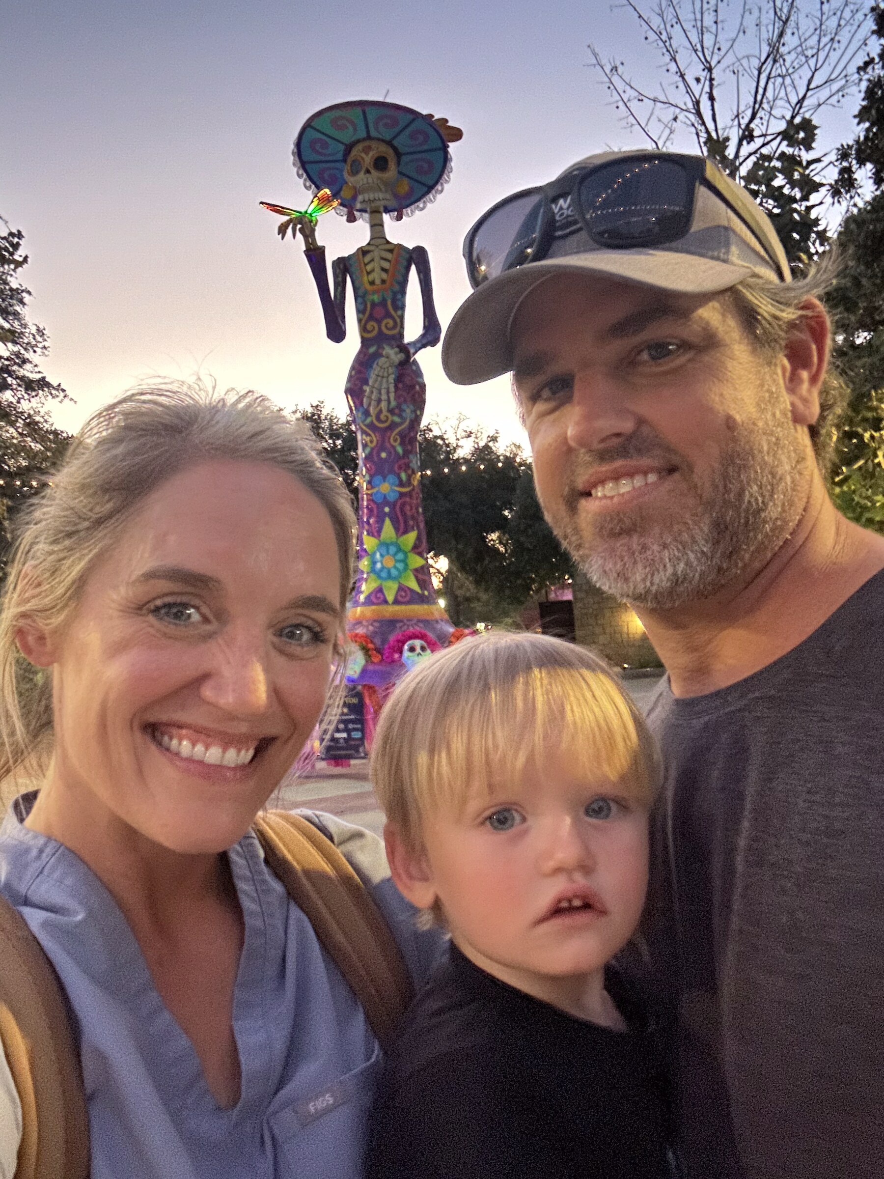 Jonathan and our boy driving the wakeboat on Canyon Lake
